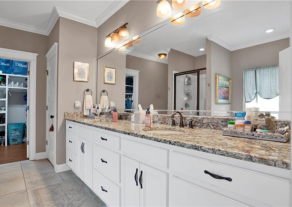 Separate dining room with detailed trim at 28110 Annabelle Lane