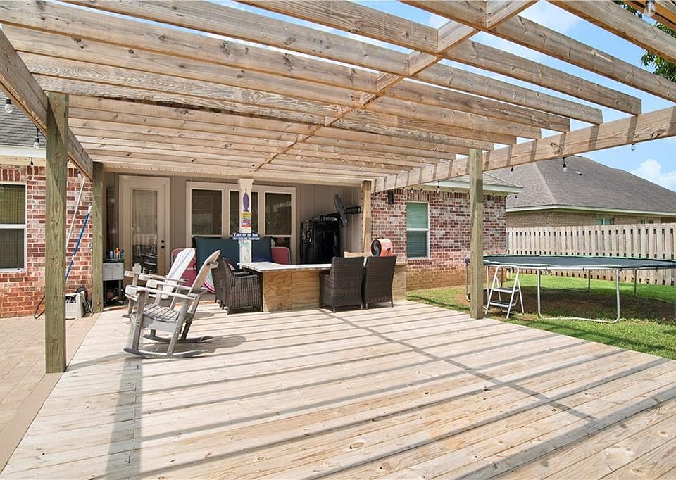 Covered backyard patio and deck at 28110 Annabelle Lane