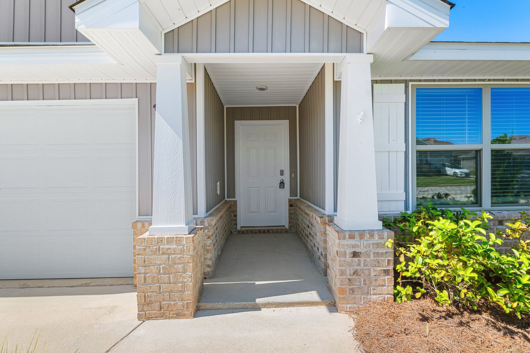 Covered front entry at 24061 Citation Loop