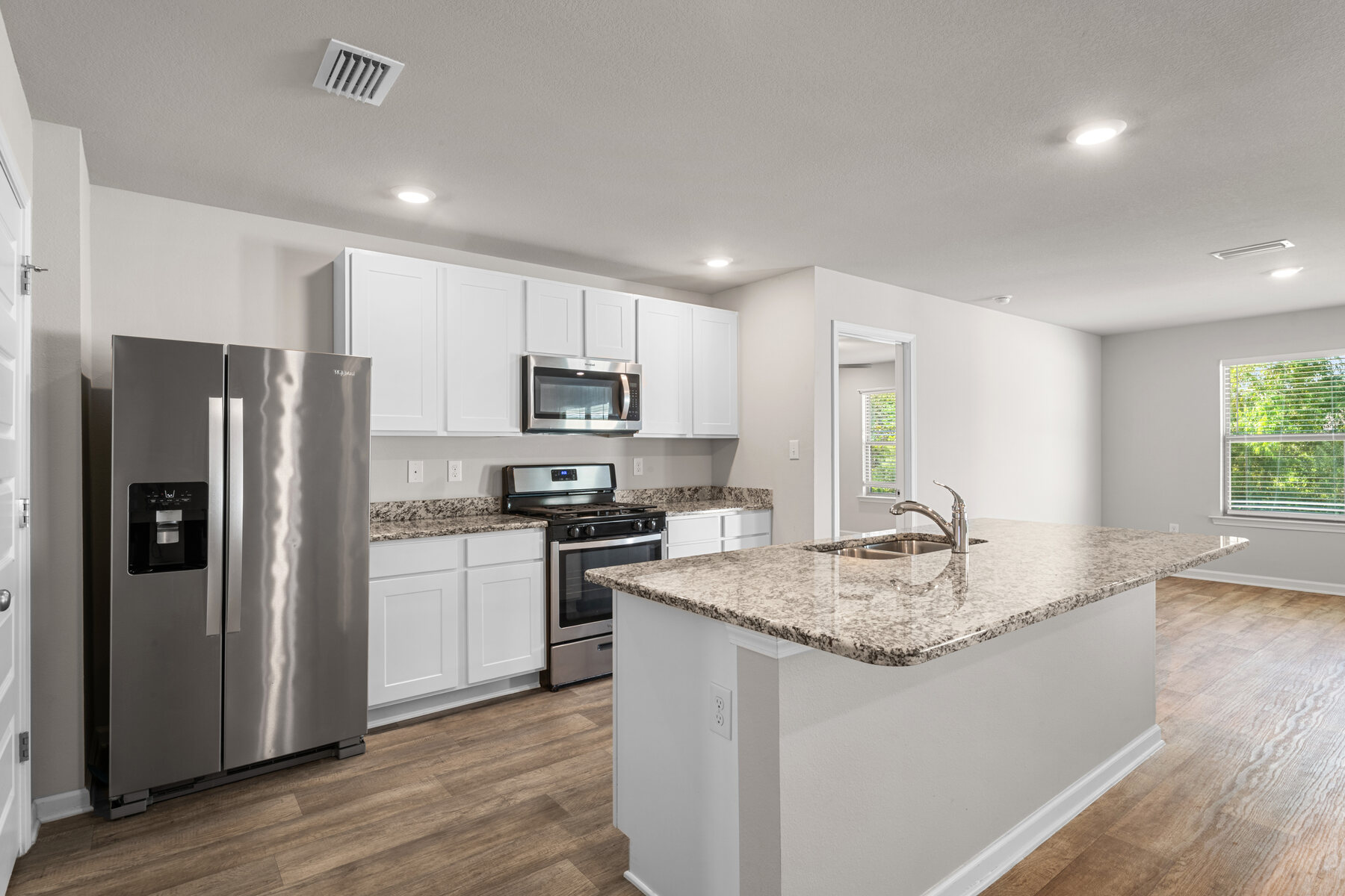 Kitchen island and stainless appliances at 24061 Citation Loop