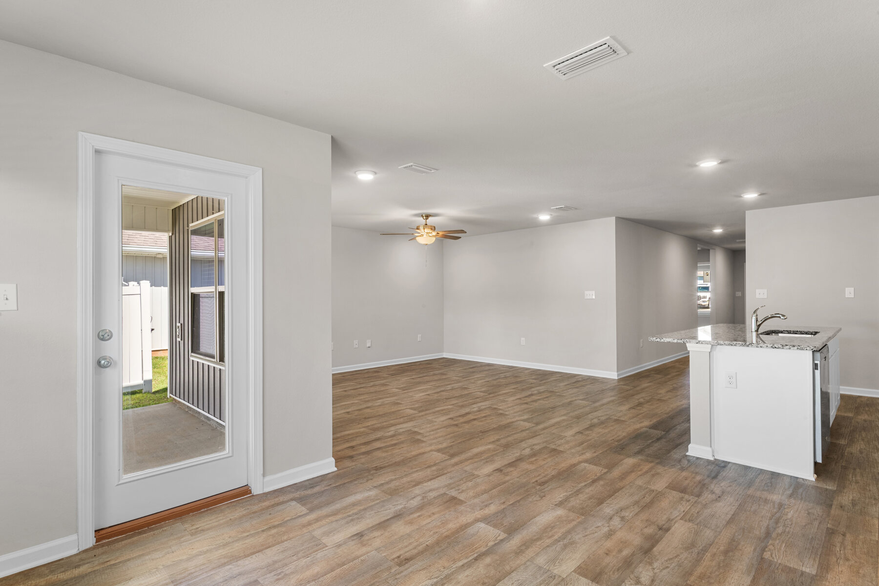 Dining and living areas at 24061 Citation Loop